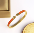 22K Gold Plated Stainless Steel Orange / Black Strip Bracelet | Anti-Tarnish Bold Colour Band Bracelet | Trendy Everyday Jewellery for Women